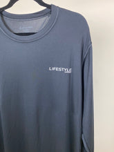 Load image into Gallery viewer, Lifestyle black long sleeve performance shirt
